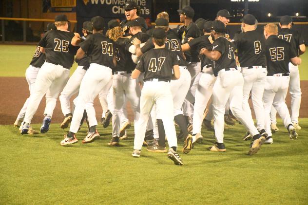 West Virginia Black Bears rush the field