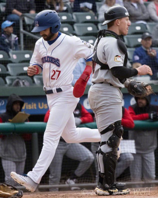 David Vinsky crosses home plate for the New York Boulders