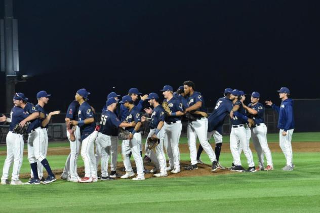 Tri-City Dust Devils celebrate win