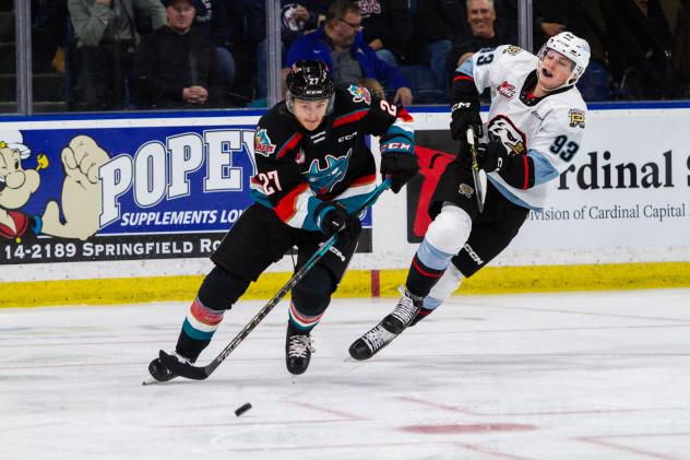 Kelowna Rockets' Jackson DeSouza versus Portland Winterhawks' Nicholas Johnson