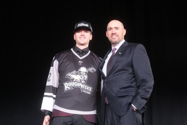 Calgary Roughnecks draftee Seth Van Schepen and NLL Commissioner Brett Frood