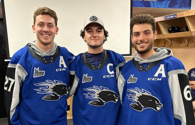 Saint John Sea Dogs' Connor Trenholm, Charlie DesRoches, and Marshall Lessard wearing their jerseys with letters