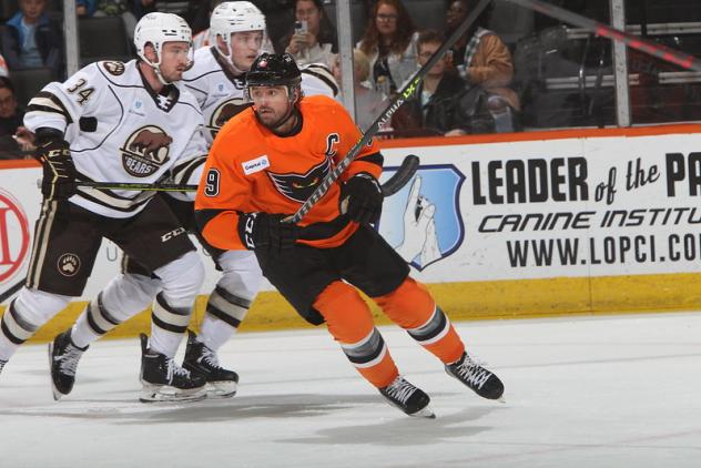 Lehigh Valley Phantoms' Cal O'Reilly and Hershey Bears' RYAN SCARFO in action