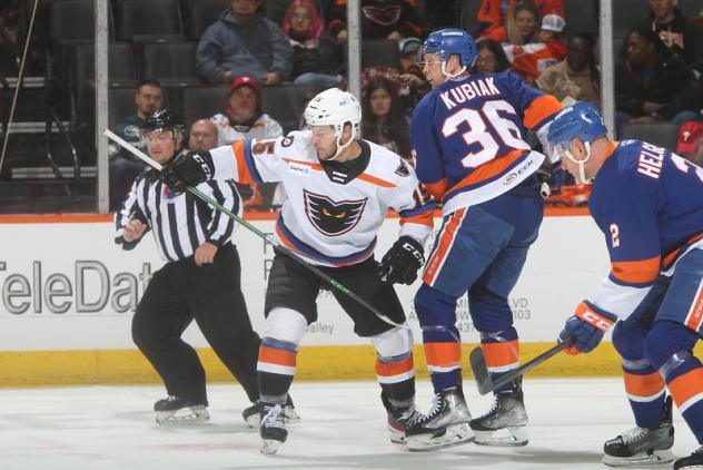 Lehigh Valley Phantoms' Jordy Bellerive versus Bridgeport Islanders' Jeff Kubiak and Seth Helgeson