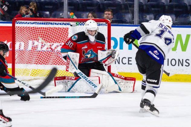 Kelowna Rockets' Jari Kykkanen Defends Against Victoria Royals' Carter Dereniwsky