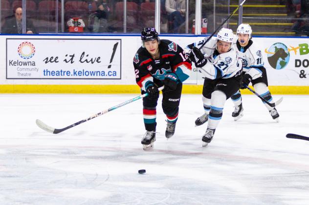 Kelowna Rockets' Will Munro versus Winnipeg ICE's Josh Medernach and Skyler Bruce