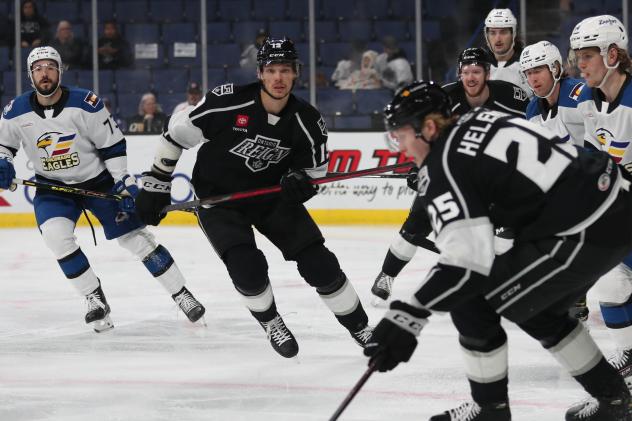 Ontario Reign forward Nikita Pavlychev (center)