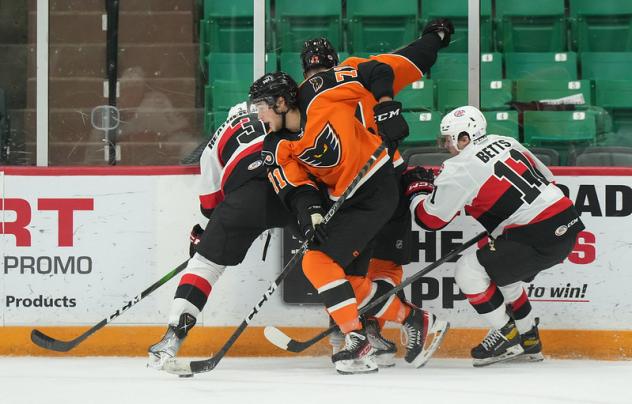 Lehigh Valley Phantoms' Tyson Foerster battles Belleville Senators' Dillon Heatherington and Kyle Betts