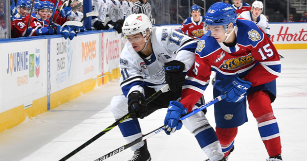 Victoria Royals' Matthew Hodson battles Edmonton Oil Kings' Cole Miller