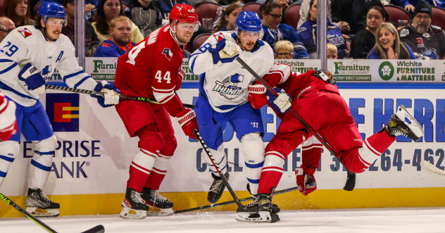 Wichita Thunder's Brayden Watts and Dillon Hamaliuk battle Allen Americans' Andrew Durhamon on game day